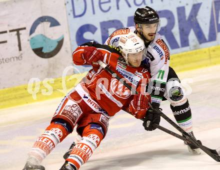 EBEL. Eishockey Bundesliga. KAC gegen HDD TELEMACH Olimpija Ljubljana.  Stephan Geier,  (KAC), Ziga Pesut (Laibach). Klagenfurt, am 17.12.2013
Foto: Kuess 

---
pressefotos, pressefotografie, kuess, qs, qspictures, sport, bild, bilder, bilddatenbank