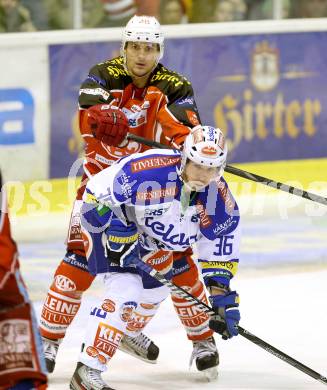 EBEL. Eishockey Bundesliga. KAC gegen VSV. Florian Iberer, (KAC),  Marco Pewal  (VSV). Klagenfurt, am 26.12.2013
Foto: Kuess 

---
pressefotos, pressefotografie, kuess, qs, qspictures, sport, bild, bilder, bilddatenbank