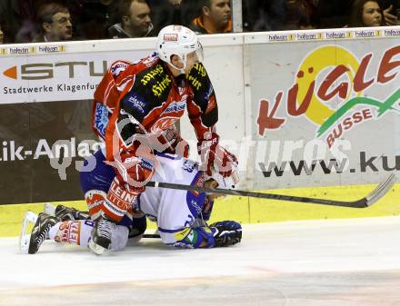 EBEL. Eishockey Bundesliga. KAC gegen VSV. Johannes Reichel, (KAC),  Marius Goehringer  (VSV). Klagenfurt, am 26.12.2013
Foto: Kuess 

---
pressefotos, pressefotografie, kuess, qs, qspictures, sport, bild, bilder, bilddatenbank