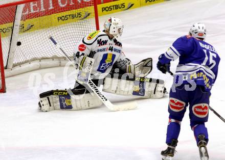 EBEL. Eishockey Bundesliga. EC VSV gegen Dornbirner Eishockey Club.  Daniel Nageler, (VSV), Dennis Adam  (Dornbirn). Villach, am 30.12.2013.
Foto: Kuess 


---
pressefotos, pressefotografie, kuess, qs, qspictures, sport, bild, bilder, bilddatenbank