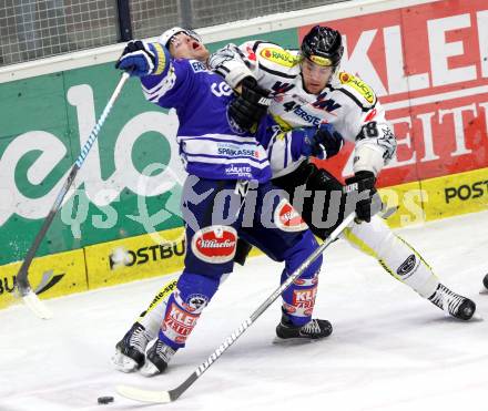 EBEL. Eishockey Bundesliga. EC VSV gegen Dornbirner Eishockey Club.  Brock McBride, (VSV), Matthew Plante (Dornbirn). Villach, am 30.12.2013.
Foto: Kuess 


---
pressefotos, pressefotografie, kuess, qs, qspictures, sport, bild, bilder, bilddatenbank