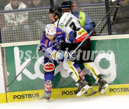 EBEL. Eishockey Bundesliga. EC VSV gegen Dornbirner Eishockey Club.  Brock McBride, (VSV), Olivier Magnan-Grenier (Dornbirn). Villach, am 30.12.2013.
Foto: Kuess 


---
pressefotos, pressefotografie, kuess, qs, qspictures, sport, bild, bilder, bilddatenbank