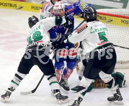 EBEL. Eishockey Bundesliga. EC VSV gegen HDD TELEMACH Olimpija Ljubljana. Derek Ryan,  (VSV), Kenneth Macauley, Jake Laplante (Laibach). Villach, am 1.1.2014.
Foto: Kuess 


---
pressefotos, pressefotografie, kuess, qs, qspictures, sport, bild, bilder, bilddatenbank