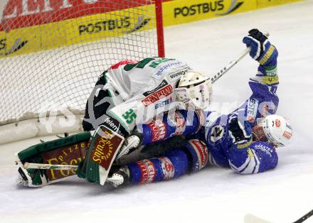 EBEL. Eishockey Bundesliga. EC VSV gegen HDD TELEMACH Olimpija Ljubljana. Curtis Fraser,  (VSV), Jerry Kuhn (Laibach). Villach, am 1.1.2014.
Foto: Kuess 


---
pressefotos, pressefotografie, kuess, qs, qspictures, sport, bild, bilder, bilddatenbank