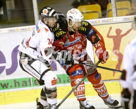 EBEL. Eishockey Bundesliga. KAC gegen HC TWK Innsbruck Die Haie. Jamie Lundmark, (KAC), Florian Pedevilla  (Innsbruck). Klagenfurt, am 10.1.2014.
Foto: Kuess 

---
pressefotos, pressefotografie, kuess, qs, qspictures, sport, bild, bilder, bilddatenbank