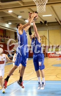 Basketball 2. Bundesliga. Woerthersee Piraten gegen Vienna D.C. .  Marvin Ogunsipe, Daniel Stawowski  (Vienna). Klagenfurt, am 11.1.2014.
Foto: Kuess
---
pressefotos, pressefotografie, kuess, qs, qspictures, sport, bild, bilder, bilddatenbank