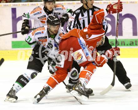 EBEL. Eishockey Bundesliga. KAC gegen HDD TELEMACH Olimpija Ljubljana.  Manuel Geier,  (KAC), Ziga Pesut (Laibach. Klagenfurt, am 17.1.2014.
Foto: Kuess 

---
pressefotos, pressefotografie, kuess, qs, qspictures, sport, bild, bilder, bilddatenbank