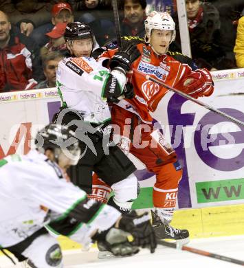 EBEL. Eishockey Bundesliga. KAC gegen HDD TELEMACH Olimpija Ljubljana.  Manuel Geier, (KAC), Matej Hocevar  (Laibach. Klagenfurt, am 17.1.2014.
Foto: Kuess 

---
pressefotos, pressefotografie, kuess, qs, qspictures, sport, bild, bilder, bilddatenbank