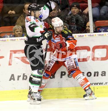 EBEL. Eishockey Bundesliga. KAC gegen HDD TELEMACH Olimpija Ljubljana.  Martin Schumnig, (KAC), Andrej Hebar  (Laibach. Klagenfurt, am 17.1.2014.
Foto: Kuess 

---
pressefotos, pressefotografie, kuess, qs, qspictures, sport, bild, bilder, bilddatenbank