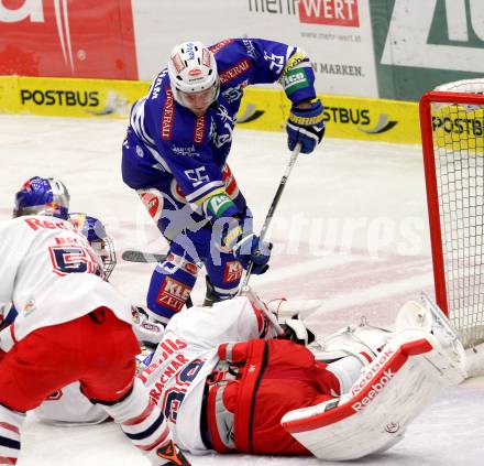 EBEL. Eishockey Bundesliga. EC VSV gegen EC Red Bull Salzburg.  Scott Hotham, (VSV), Luka Gracnar, (Salzburg).. Villach, am 19.1.2014.
Foto: Kuess 


---
pressefotos, pressefotografie, kuess, qs, qspictures, sport, bild, bilder, bilddatenbank