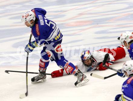 EBEL. Eishockey Bundesliga. EC VSV gegen EC Red Bull Salzburg. Eric Hunter, (VSV), Garrett Roe  (Salzburg). Villach, am 19.1.2014.
Foto: Kuess 


---
pressefotos, pressefotografie, kuess, qs, qspictures, sport, bild, bilder, bilddatenbank