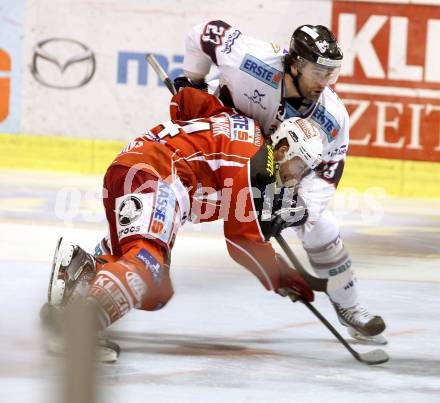 EBEL. Eishockey Bundesliga. KAC gegen SAPA Fehervar AV19.  Jamie Lundmark,  (KAC), Arpad  Mihaly (Alba Volan).. Klagenfurt, am 24.1.2014.
Foto: Kuess 

---
pressefotos, pressefotografie, kuess, qs, qspictures, sport, bild, bilder, bilddatenbank