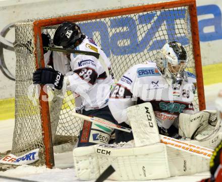 EBEL. Eishockey Bundesliga. KAC gegen SAPA Fehervar AV19.  Zoltan Hetenyi, Frank Banham (Alba Volan). Klagenfurt, am 24.1.2014.
Foto: Kuess 

---
pressefotos, pressefotografie, kuess, qs, qspictures, sport, bild, bilder, bilddatenbank