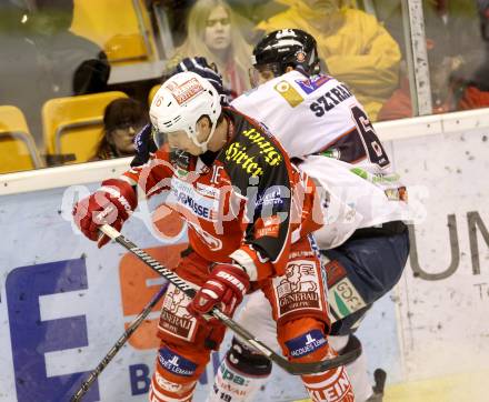 EBEL. Eishockey Bundesliga. KAC gegen SAPA Fehervar AV19. Patrick Harand, (KAC), Bence Sziranyi  (Alba Volan). Klagenfurt, am 24.1.2014.
Foto: Kuess 

---
pressefotos, pressefotografie, kuess, qs, qspictures, sport, bild, bilder, bilddatenbank