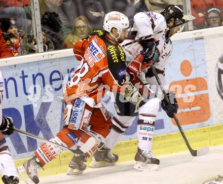 EBEL. Eishockey Bundesliga. KAC gegen SAPA Fehervar AV19. Martin Schumnig,  (KAC), Arpad Mihaly (Alba Volan). Klagenfurt, am 24.1.2014.
Foto: Kuess 

---
pressefotos, pressefotografie, kuess, qs, qspictures, sport, bild, bilder, bilddatenbank