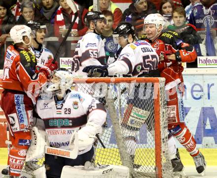 EBEL. Eishockey Bundesliga. KAC gegen SAPA Fehervar AV19. Mike Siklenka, (KAC), Attila Orban  (Alba Volan). Klagenfurt, am 24.1.2014.
Foto: Kuess 

---
pressefotos, pressefotografie, kuess, qs, qspictures, sport, bild, bilder, bilddatenbank