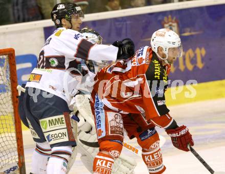 EBEL. Eishockey Bundesliga. KAC gegen SAPA Fehervar AV19.  Colton Fretter, (KAC), Andy Sertich (Alba Volan). Klagenfurt, am 24.1.2014.
Foto: Kuess 

---
pressefotos, pressefotografie, kuess, qs, qspictures, sport, bild, bilder, bilddatenbank