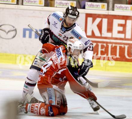 EBEL. Eishockey Bundesliga. KAC gegen SAPA Fehervar AV19.  Jamie Lundmark,  (KAC), Arpad  Mihaly (Alba Volan). Klagenfurt, am 24.1.2014.
Foto: Kuess 

---
pressefotos, pressefotografie, kuess, qs, qspictures, sport, bild, bilder, bilddatenbank