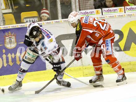 EBEL. Eishockey Bundesliga. KAC gegen SAPA Fehervar AV19. John Lammers,  (KAC), Attila Orban (Alba Volan). Klagenfurt, am 24.1.2014.
Foto: Kuess 

---
pressefotos, pressefotografie, kuess, qs, qspictures, sport, bild, bilder, bilddatenbank