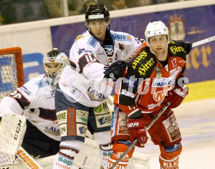 EBEL. Eishockey Bundesliga. KAC gegen SAPA Fehervar AV19. Colton Fretter, (KAC), Andy Sertich  (Alba Volan). Klagenfurt, am 24.1.2014.
Foto: Kuess 

---
pressefotos, pressefotografie, kuess, qs, qspictures, sport, bild, bilder, bilddatenbank