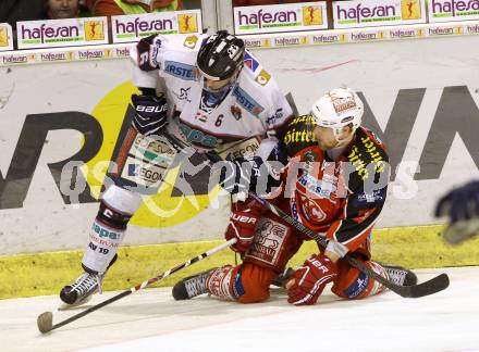 EBEL. Eishockey Bundesliga. KAC gegen SAPA Fehervar AV19. Markus Pirmann,  (KAC), Bence Sziranyi (Alba Volan). Klagenfurt, am 24.1.2014.
Foto: Kuess 

---
pressefotos, pressefotografie, kuess, qs, qspictures, sport, bild, bilder, bilddatenbank