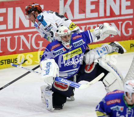 EBEL. Eishockey Bundesliga. EC VSV gegen EHC LIWEST Linz. Jean Philippe Lamoureux, (VSV), Jason Ulmer  (Linz). Villach, am 26.1.2014.
Foto: Kuess 


---
pressefotos, pressefotografie, kuess, qs, qspictures, sport, bild, bilder, bilddatenbank