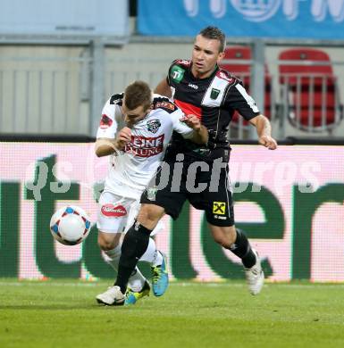 Fussball Bundesliga. RZ Pellets WAC gegen FC Wacker Innsbruck. Manuel Kerhe, (WAC), Felicio Marques Junior  (Innsbruck). Klagenfurt, 8.2.2014.
Foto: Kuess

---
pressefotos, pressefotografie, kuess, qs, qspictures, sport, bild, bilder, bilddatenbank