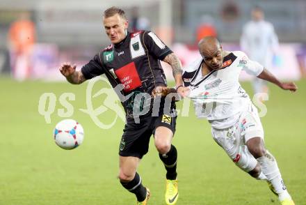 Fussball Bundesliga. RZ Pellets WAC gegen FC Wacker Innsbruck. De Oliveira Silvio Carlos, (WAC), Zeljko Djokic  (Innsbruck). Klagenfurt, 8.2.2014.
Foto: Kuess

---
pressefotos, pressefotografie, kuess, qs, qspictures, sport, bild, bilder, bilddatenbank