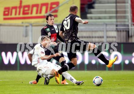 Fussball Bundesliga. RZ Pellets WAC gegen FC Wacker Innsbruck. Peter Zulj, (WAC), Zeljko Djokic  (Innsbruck). Klagenfurt, 8.2.2014.
Foto: Kuess

---
pressefotos, pressefotografie, kuess, qs, qspictures, sport, bild, bilder, bilddatenbank