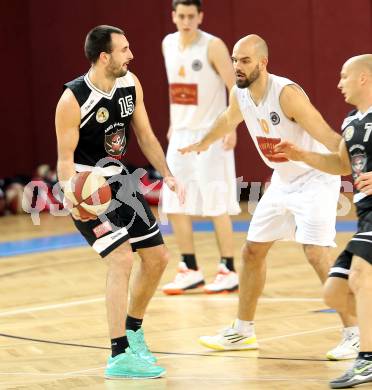 Basketball 2. Bundesliga. Woerthersee Piraten gegen Villach Raiders.  Joachim Buggelsheim, (Piraten), Matic Pticak  (Villach). Klagenfurt, am 15.2.2014.
Foto: Kuess
---
pressefotos, pressefotografie, kuess, qs, qspictures, sport, bild, bilder, bilddatenbank