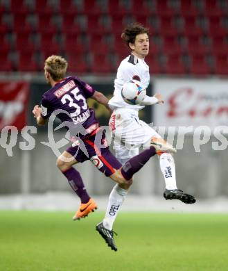 Fussball Bundesliga. RZ Pellets WAC gegen FK Austria Wien. Christian Falk (WAC), Thomas Salamon (Wien). Klagenfurt, 22.2.2014.
Foto: Kuess

---
pressefotos, pressefotografie, kuess, qs, qspictures, sport, bild, bilder, bilddatenbank