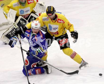 EBEL. Eishockey Bundesliga. EC VSV gegen UPC Vienna Capitals. Curtis Fraser,  (VSV), Adrian Veidemann (Vienna). Villach, am 28.2.2014.
Foto: Kuess 


---
pressefotos, pressefotografie, kuess, qs, qspictures, sport, bild, bilder, bilddatenbank