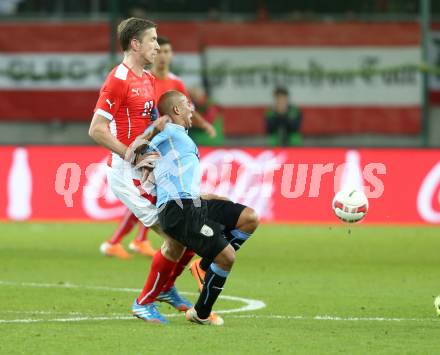 Fussball Laenderspiel. Oesterreich gegen Uruguay. Marc Janko, (Oesterreich), Egidio Arevalo Rios  (Uruguay). Klagenfurt, 5.3.2014.
Foto: Kuess

---
pressefotos, pressefotografie, kuess, qs, qspictures, sport, bild, bilder, bilddatenbank