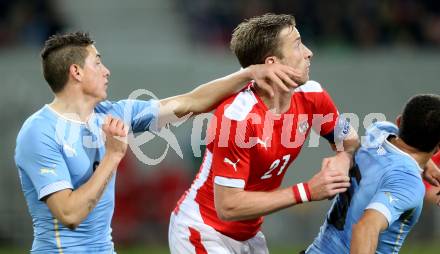 Fussball Laenderspiel. Oesterreich gegen Uruguay. Marc Janko, (Oesterreich), Jose Gimenez  (Uruguay). Klagenfurt, 5.3.2014.
Foto: Kuess

---
pressefotos, pressefotografie, kuess, qs, qspictures, sport, bild, bilder, bilddatenbank