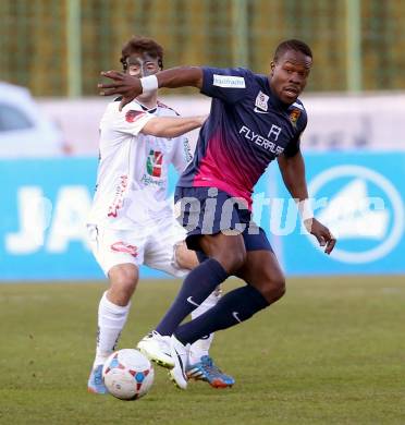 Fussball Bundesliga. RZ Pellets WAC gegen FC Admira Wacker Moedling. Joachim Standfest,  (WAC), Wilfried Domoraud (Admira). Klagenfurt, 8.3.2014.
Foto: Kuess

---
pressefotos, pressefotografie, kuess, qs, qspictures, sport, bild, bilder, bilddatenbank