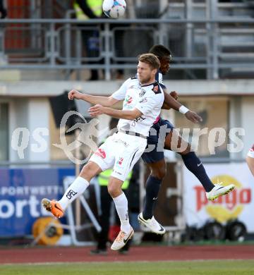 Fussball Bundesliga. RZ Pellets WAC gegen FC Admira Wacker Moedling. Boris Huettenbrenner, (WAC), Wilfried Domoraud  (Admira). Klagenfurt, 8.3.2014.
Foto: Kuess

---
pressefotos, pressefotografie, kuess, qs, qspictures, sport, bild, bilder, bilddatenbank