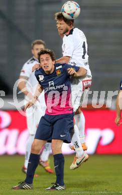 Fussball Bundesliga. RZ Pellets WAC gegen FC Admira Wacker Moedling. Boris Huettenbrenner, (WAC),  Lukas Thuerauer  (Admira). Klagenfurt, 8.3.2014.
Foto: Kuess

---
pressefotos, pressefotografie, kuess, qs, qspictures, sport, bild, bilder, bilddatenbank