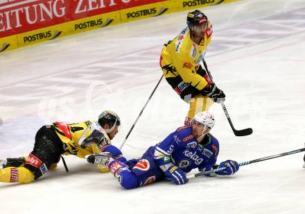 EBEL. Eishockey Bundesliga. EC VSV gegen UPC Vienna Capitals. Eric Hunter, (VSV), Jamie Fraser (Vienna). Villach, am 9.3.2014.
Foto: Kuess 


---
pressefotos, pressefotografie, kuess, qs, qspictures, sport, bild, bilder, bilddatenbank