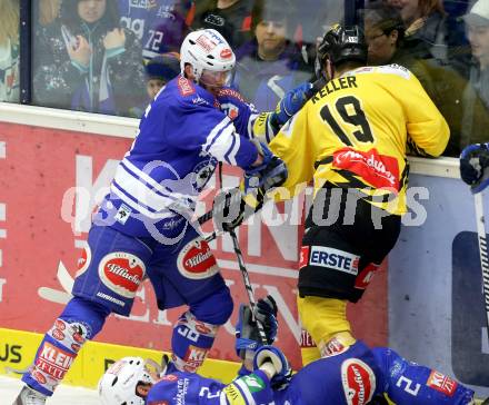 EBEL. Eishockey Bundesliga. EC VSV gegen UPC Vienna Capitals. Marco Pewal, (VSV),  Justin Keller  (Vienna). Villach, am 14.3.2014.
Foto: Kuess 


---
pressefotos, pressefotografie, kuess, qs, qspictures, sport, bild, bilder, bilddatenbank