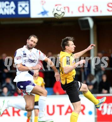 Fussball Regionalliga. SAK gegen Voecklamarkt.  Marjan Kropiunik, (SAK), Joachim Gilhofer (Voecklamarkt). Welzenegg, amm 15.3.2014.
Foto: Kuess
---
pressefotos, pressefotografie, kuess, qs, qspictures, sport, bild, bilder, bilddatenbank