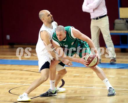 Basketball 2. Bundesliga. Woerthersee Piraten gegen BK Mattersburg Rocks. Joachim Buggelsheim (Piraten), Hallett Corey (Mattersburg). Klagenfurt, am 22.3.2014.
Foto: Kuess 
---
pressefotos, pressefotografie, kuess, qs, qspictures, sport, bild, bilder, bilddatenbank