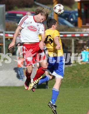 Fussball Unterliga Ost. Ludmannsdorf gegen St. Michael/Bleiburg. Dejan Smeh (Ludmannsdorf),  Michael Hubert Zidej (St. Michael). Ludmannsdorf, am 30.3.2014.
Foto: Kuess
---
pressefotos, pressefotografie, kuess, qs, qspictures, sport, bild, bilder, bilddatenbank