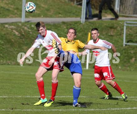 Fussball Unterliga Ost. Ludmannsdorf gegen St. Michael/Bleiburg. Martin Klemenjak  (Ludmannsdorf),  Juergen Galo (St. Michael). Ludmannsdorf, am 30.3.2014.
Foto: Kuess
---
pressefotos, pressefotografie, kuess, qs, qspictures, sport, bild, bilder, bilddatenbank