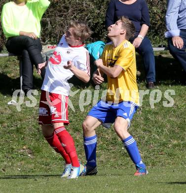 Fussball Unterliga Ost. Ludmannsdorf gegen St. Michael/Bleiburg. Julian Hobel (Ludmannsdorf),  Simon Kap (St. Michael). Ludmannsdorf, am 30.3.2014.
Foto: Kuess
---
pressefotos, pressefotografie, kuess, qs, qspictures, sport, bild, bilder, bilddatenbank