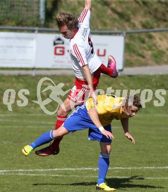 Fussball Unterliga Ost. Ludmannsdorf gegen St. Michael/Bleiburg. Dejan Smeh (Ludmannsdorf),  Manuel Krainz (St. Michael). Ludmannsdorf, am 30.3.2014.
Foto: Kuess
---
pressefotos, pressefotografie, kuess, qs, qspictures, sport, bild, bilder, bilddatenbank