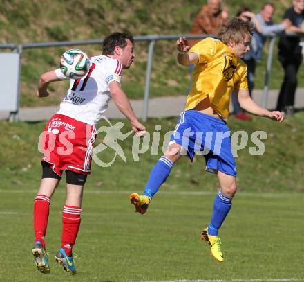 Fussball Unterliga Ost. Ludmannsdorf gegen St. Michael/Bleiburg. Sablatnik Michael (Ludmannsdorf),  Manuel Krainz (St. Michael). Ludmannsdorf, am 30.3.2014.
Foto: Kuess
---
pressefotos, pressefotografie, kuess, qs, qspictures, sport, bild, bilder, bilddatenbank