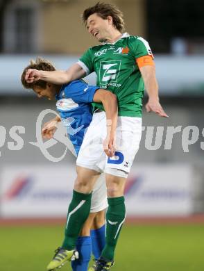 Fussball Regionalliga. VSV gegen Wallern. Moritz Guetz, (VSV), Peter Vorisek  (Wallern). Villach, 4.4.2014.
Foto: Kuess
---
pressefotos, pressefotografie, kuess, qs, qspictures, sport, bild, bilder, bilddatenbank