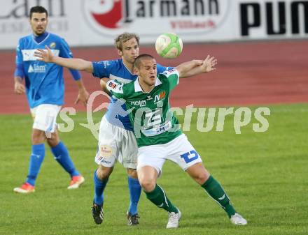 Fussball Regionalliga. VSV gegen Wallern. Martin Trattnig,  (VSV), Lukas Grgic (Wallern). Villach, 4.4.2014.
Foto: Kuess
---
pressefotos, pressefotografie, kuess, qs, qspictures, sport, bild, bilder, bilddatenbank