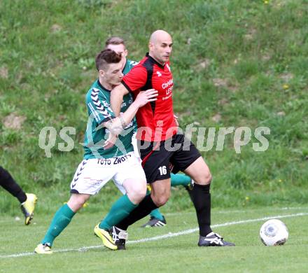 Fussball. Kaerntner Liga. Maria Saal gegen SV Feldkirchen/SV Oberglan. Senad Tiganj (Maria Saal), Philipp Wisotzky (Feldkirchen). Maria Saal, 12.4.2014.
Foto: Kuess
---
pressefotos, pressefotografie, kuess, qs, qspictures, sport, bild, bilder, bilddatenbank