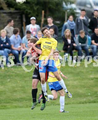 Fussball Unterliga Ost. St. Margarethen/Lav. gegen St. Michael/Lav. Daniel Schlacher (St. Margarethen), Arno Rupp (St. Michael). St. Margarethen/Lavanttal, am 12.4.2014.
Foto: Kuess
---
pressefotos, pressefotografie, kuess, qs, qspictures, sport, bild, bilder, bilddatenbank